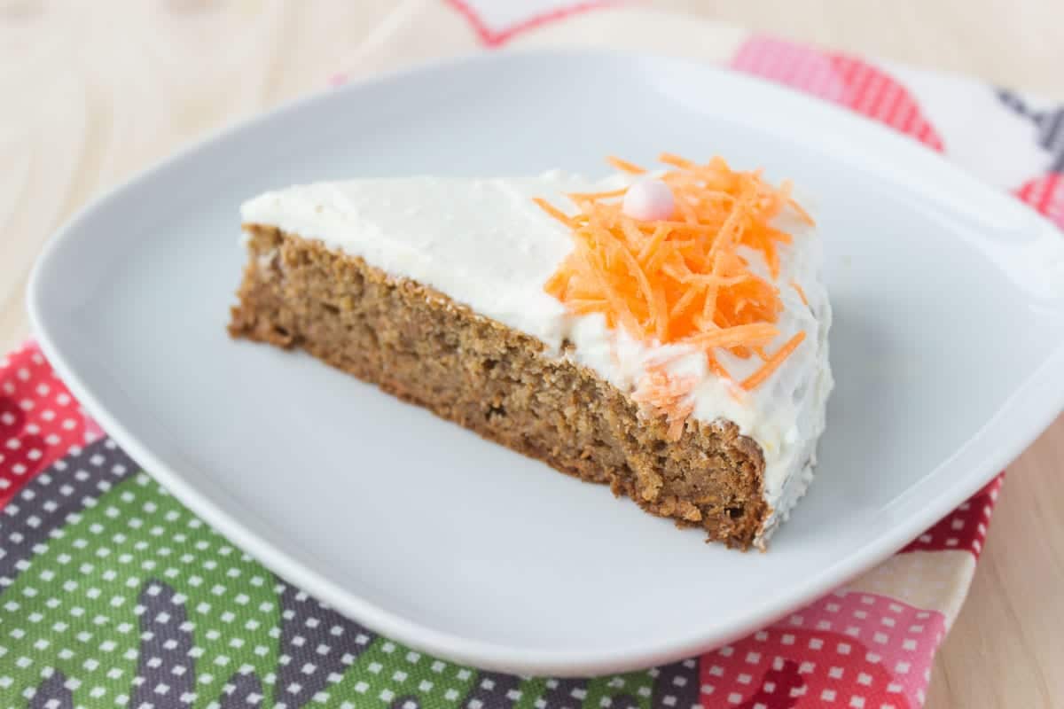 Easy Carrot Cake with Cottage Cheese Frosting made with all HEALTHY ingredients, refined sugar-free and low-calorie. Perfect Easter spring dessert. NATALIESHEALTH.COM #nosugar #lowcalorie #cake #dessert #Easter #healthy 