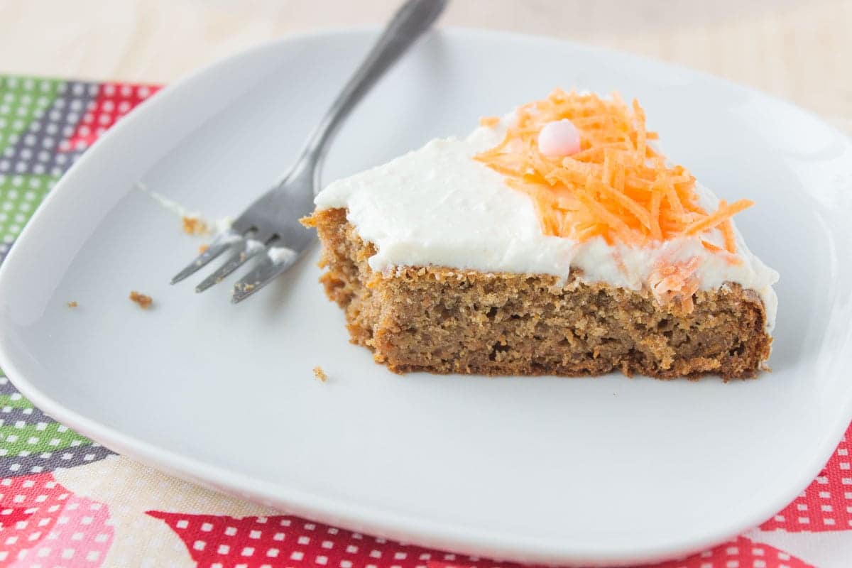 Easy Carrot Cake with Cottage Cheese Frosting made with all HEALTHY ingredients, refined sugar-free and low-calorie. Perfect Easter spring dessert. NATALIESHEALTH.COM #nosugar #lowcalorie #cake #dessert #Easter #healthy 