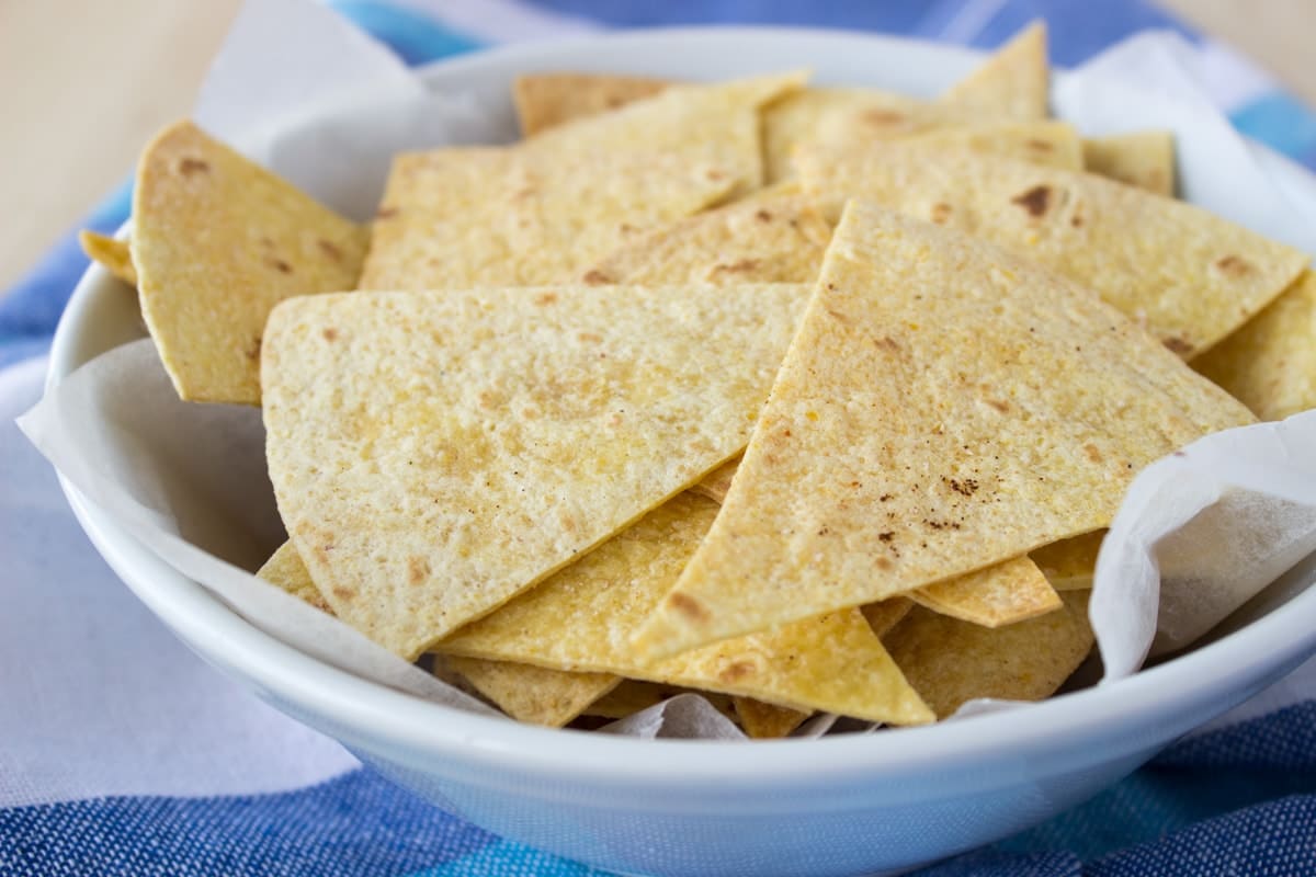 Black Bean Corn Avocado Salad with lime dressing served with homemade tortilla chips