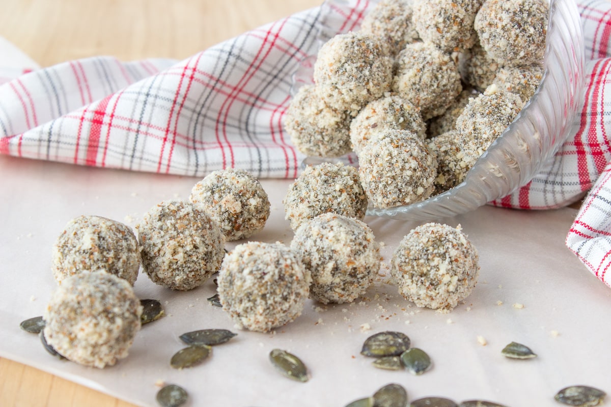 Soft, fragrant, super healthy Pumpkin Seeds Energy Balls made without added sugars. These energy balls are very nutritious, full of fibers, proteins, and healthy fats. An ideal healthy snack between meals. CLICK to grab recipe PIN for later! | Natalie's Food & Health | natalieshealth.com