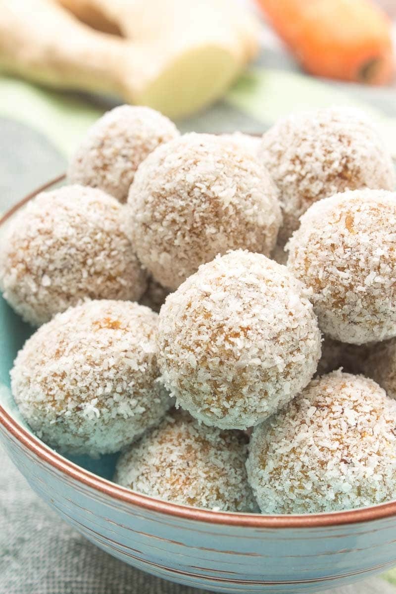 Raw no-bake Carrot Cake Energy Balls made with all HEALTHY ingredients. These yummy bites are refined sugar-free, gluten-free and vegan. Perfect snack, a post-workout snack or simple dessert. | natalieshealth.com | #vegan #glutenfree #sugarfree #Easter #healthy #easy #whole30