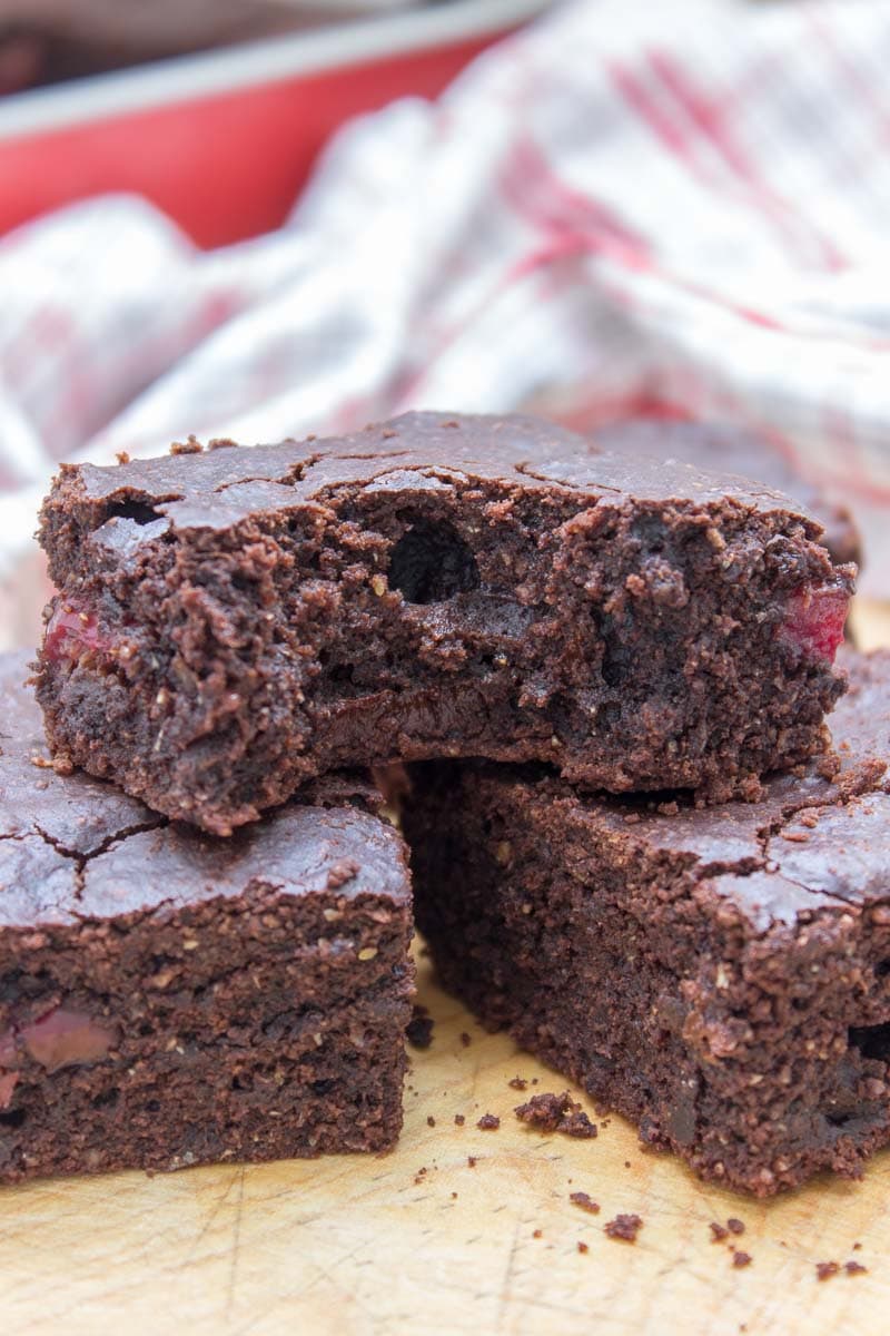 Rich, decadent, and chocolatey, these refined sugar-free Dark Chocolate Cherry Brownies are destined to delight you. Made with all HEALTHY ingredients, loaded with dark chocolate and sweet cherries, these brownies are truly a chocolate lover’s dream! #healthy #wholegrain #sugarfree #chocolate #cherry #lowcalorie #dairyfree#summer #whole30 #weightloss | natalieshealth.com