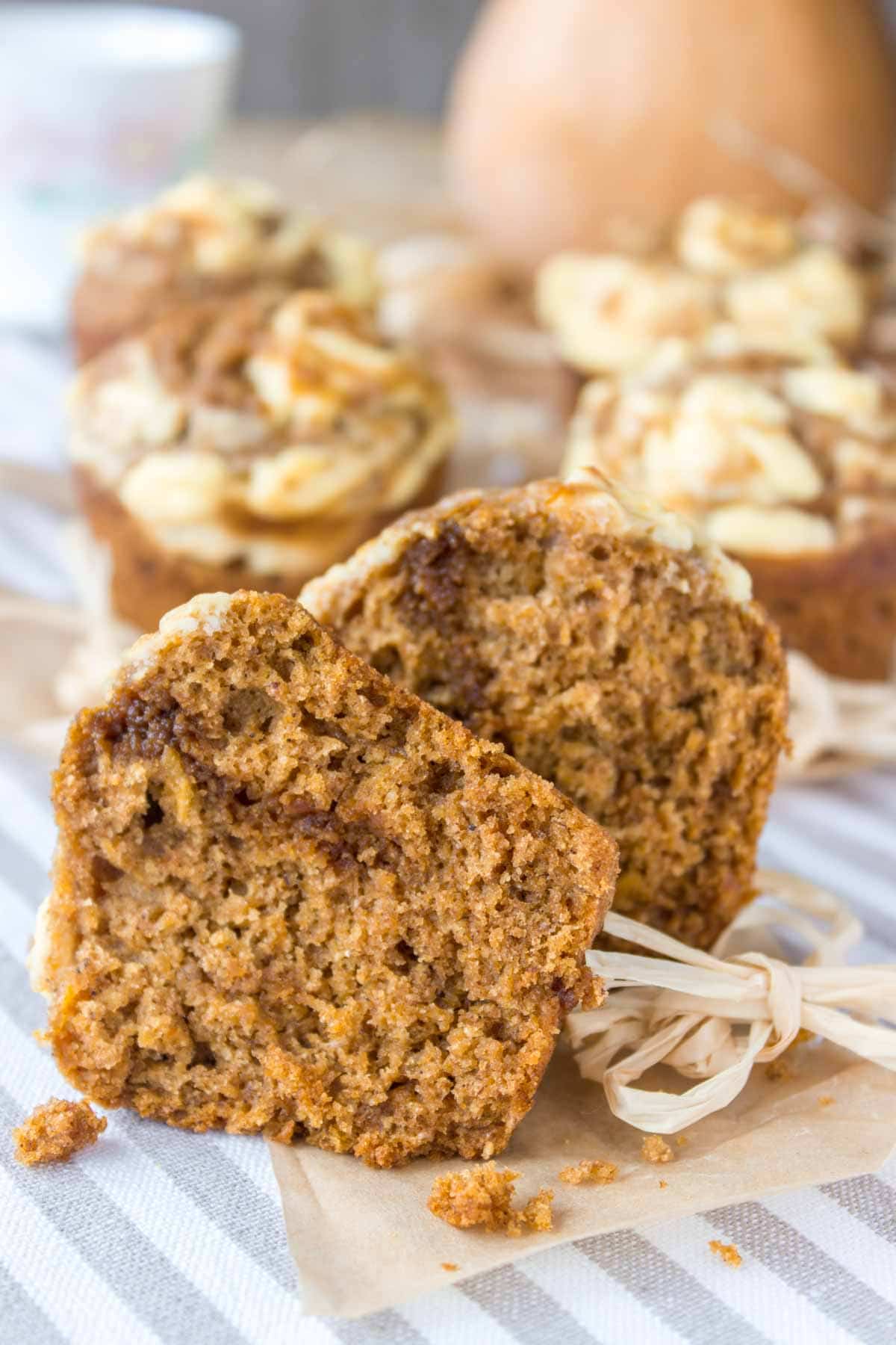 Fragrant, soft and lusciously sweet, Pumpkin Cheesecake Muffins made with all HEALTHY ingredients, refined sugar-free are the best thing this Fall. Flavored with real pumpkin and warm spices, filled with a cream cheese surprise it's a dessert that will make you wish pumpkin season last all year long. #pumpkin #fall #muffin #healthy #wholegrain #skinny #lowsugar #lowfat #easy #kidsfriendly #school #breakfast #dessert | natalieshealth.com