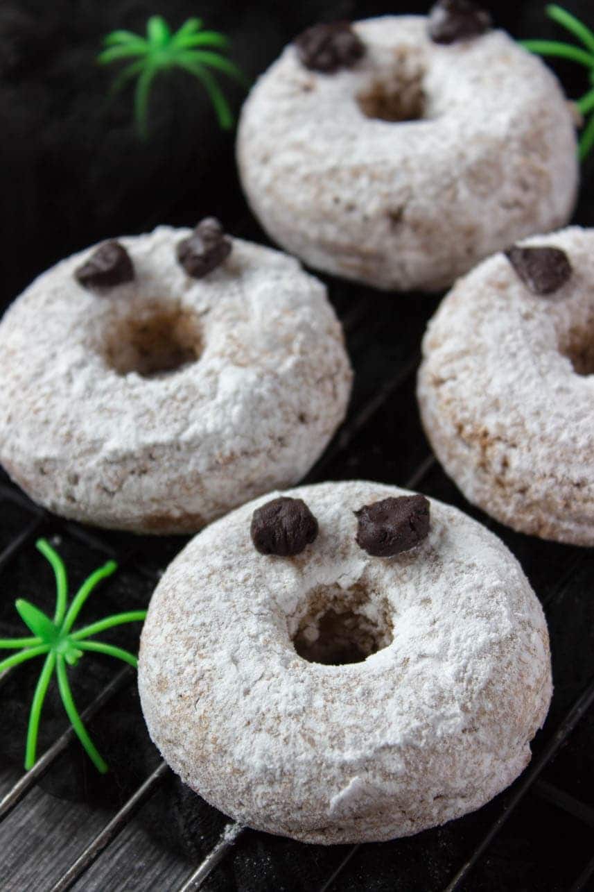 Sweet vanilla flavored Halloween Ghost Donuts are perfect Halloween party treat. These are made with all HEALTHY wholesome ingredients and refined sugar-free. Super low-calorie and super scary. BUU! #Halloween #party #kidsfriendly #donuts #healthy #lowfat #skinny #nosugar #breakfast #snack #kids #treat | www.natalieshealth.com