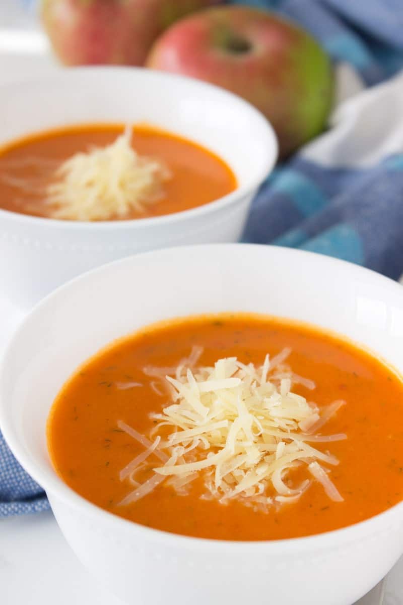 A creamy Tomato Apple Soup made with all FRESH whole ingredients is perfect immune boosting soup for upcoming colder days. Enriched with healing spice - turmeric, this soup is bursting with flavors and ready in just 30 minutes. #soup #whole30 #healthy #vegan #glutenfree #healthy #easy #apple #tomato #homemade | www.natalieshealth.com