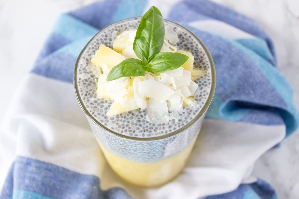 Refreshing and very nutritious, tropical pineapple coconut chia pudding is an ultimate healthy meal. Packed with high-quality proteins, fibers, healthy omega-3 acids and vitamins, you can serve this chia pudding as healthy breakfast or refreshing summer dessert. Clik to READ MORE or PIN for later!