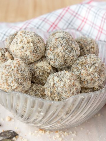 Soft, fragrant, super healthy Pumpkin Seeds Energy Balls made without added sugars. These energy balls are very nutritious, full of fibers, proteins, and healthy fats. An ideal healthy snack between meals. CLICK to grab recipe PIN for later! | Natalie's Food & Health | natalieshealth.com