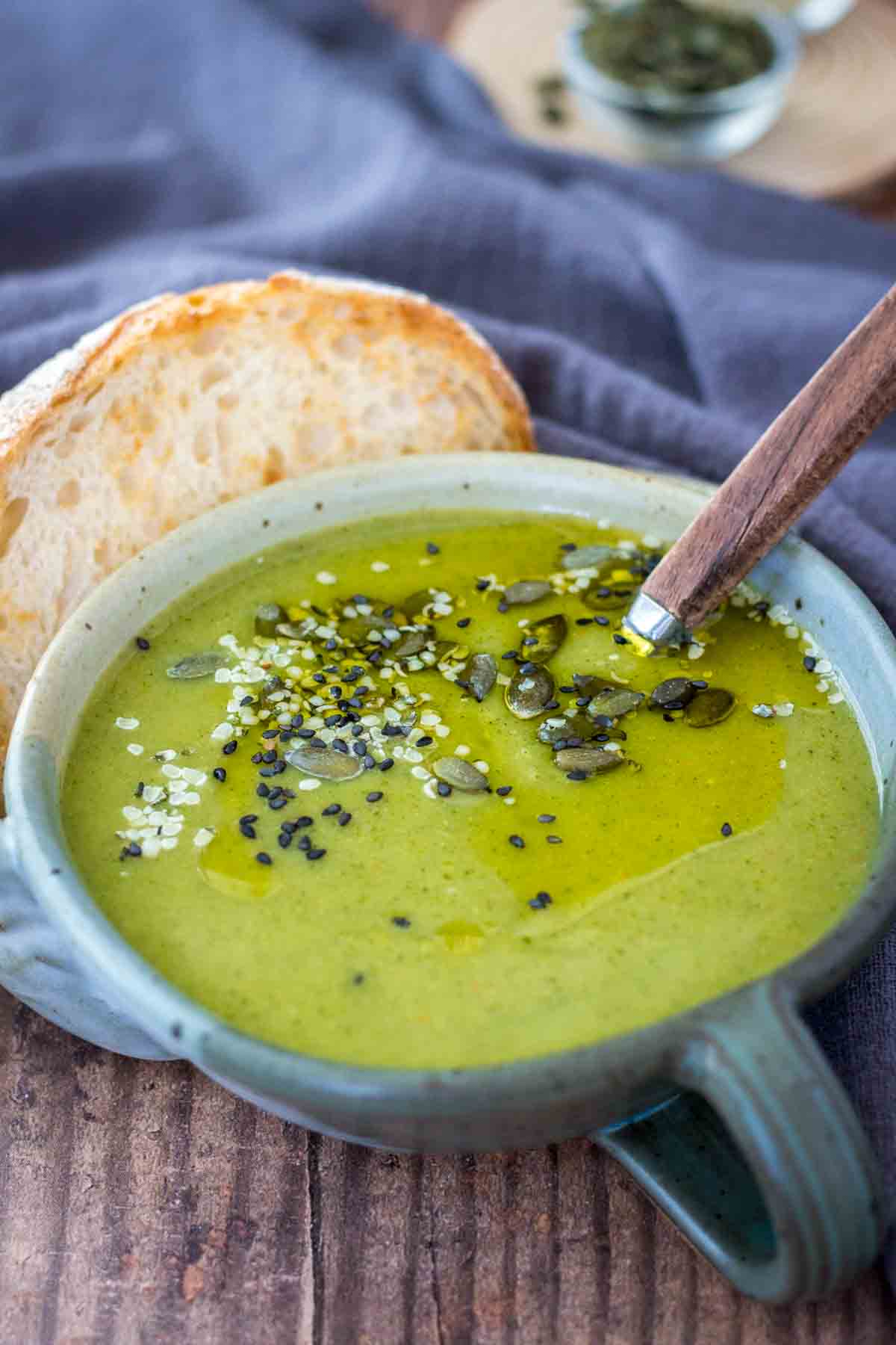 Spicy Broccoli Soup served in a bowl topped with pumpkin seeds