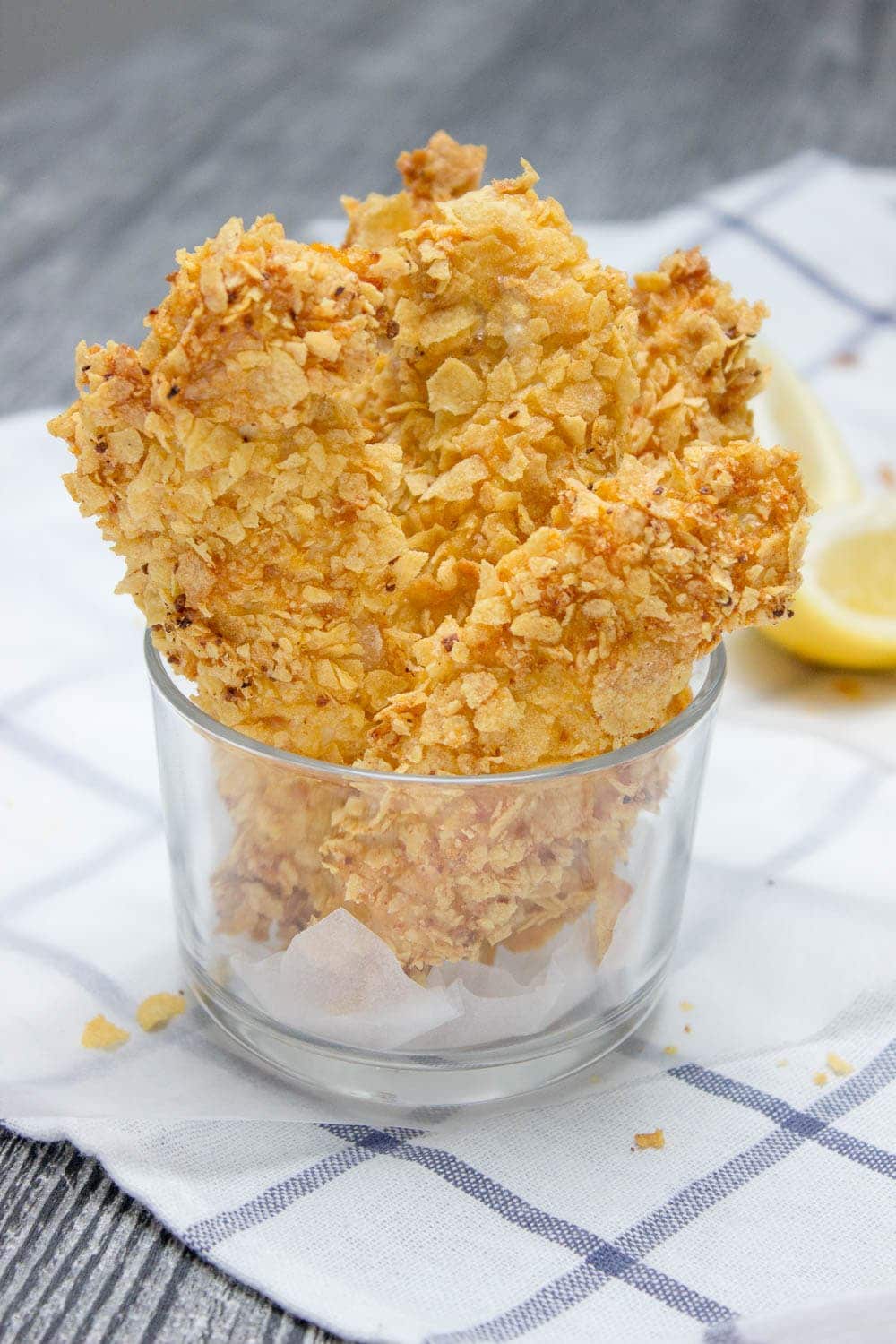 Crispy Baked Cornflake Chicken Tenders made without added fat are the perfect low-calorie, quick and HEALTHY family meal. Served with homemade Honey Dijon Sauce, these tenders are delicious gameday finger food too. CLICK to read more or PIN for later! 