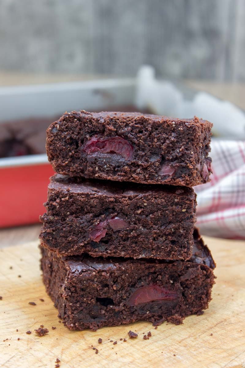 Rich, decadent, and chocolatey, these refined sugar-free Dark Chocolate Cherry Brownies are destined to delight you. Made with all HEALTHY ingredients, loaded with dark chocolate and sweet cherries, these brownies are truly a chocolate lover’s dream! #healthy #wholegrain #sugarfree #chocolate #cherry #lowcalorie #dairyfree#summer #whole30 #weightloss | natalieshealth.com