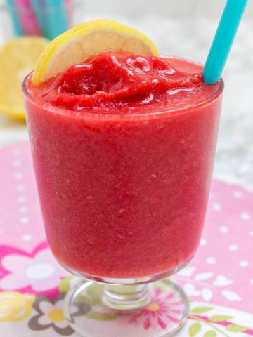 Flavorful and dazzling, Raspberry Peach Ginger Slushie is easy summer refreshment that will power you up with vitamins. Smashed summer fruits with the addition of aromatic ginger is something that will delight you and the kids. This slushie is sweet but made refined sugar-free and super HEALTHY. A must try this summer. #summer #drinks #kidsfriendly #family #vegan #sugarfree #glutenfree #fit #fruits #skinny | natalieshealth.com