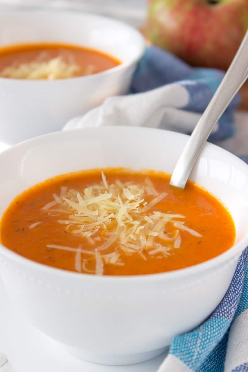 A creamy Tomato Apple Soup made with all FRESH whole ingredients is perfect immune boosting soup for upcoming colder days. Enriched with healing spice - turmeric, this soup is bursting with flavors and ready in just 30 minutes. #soup #whole30 #healthy #vegan #glutenfree #healthy #easy #apple #tomato #homemade | www.natalieshealth.com