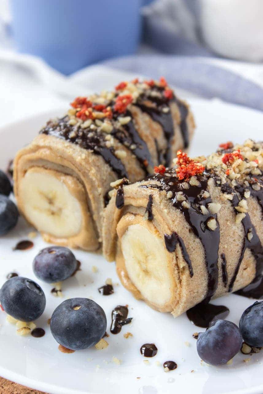 Chocolate Peanut Butter Banana Roll Ups drizzled with dark chocolate