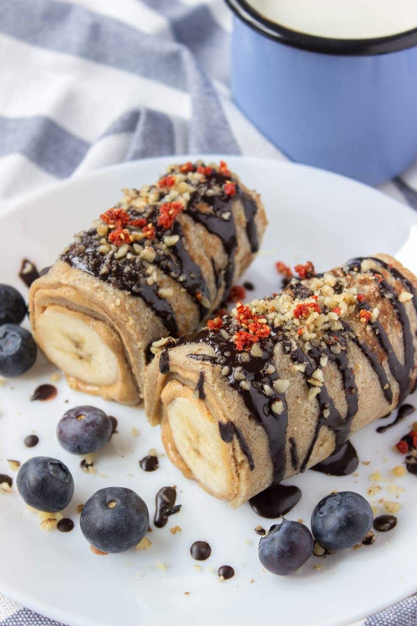 Chocolate Peanut Butter Banana Roll Ups drizzled with dark chocolate