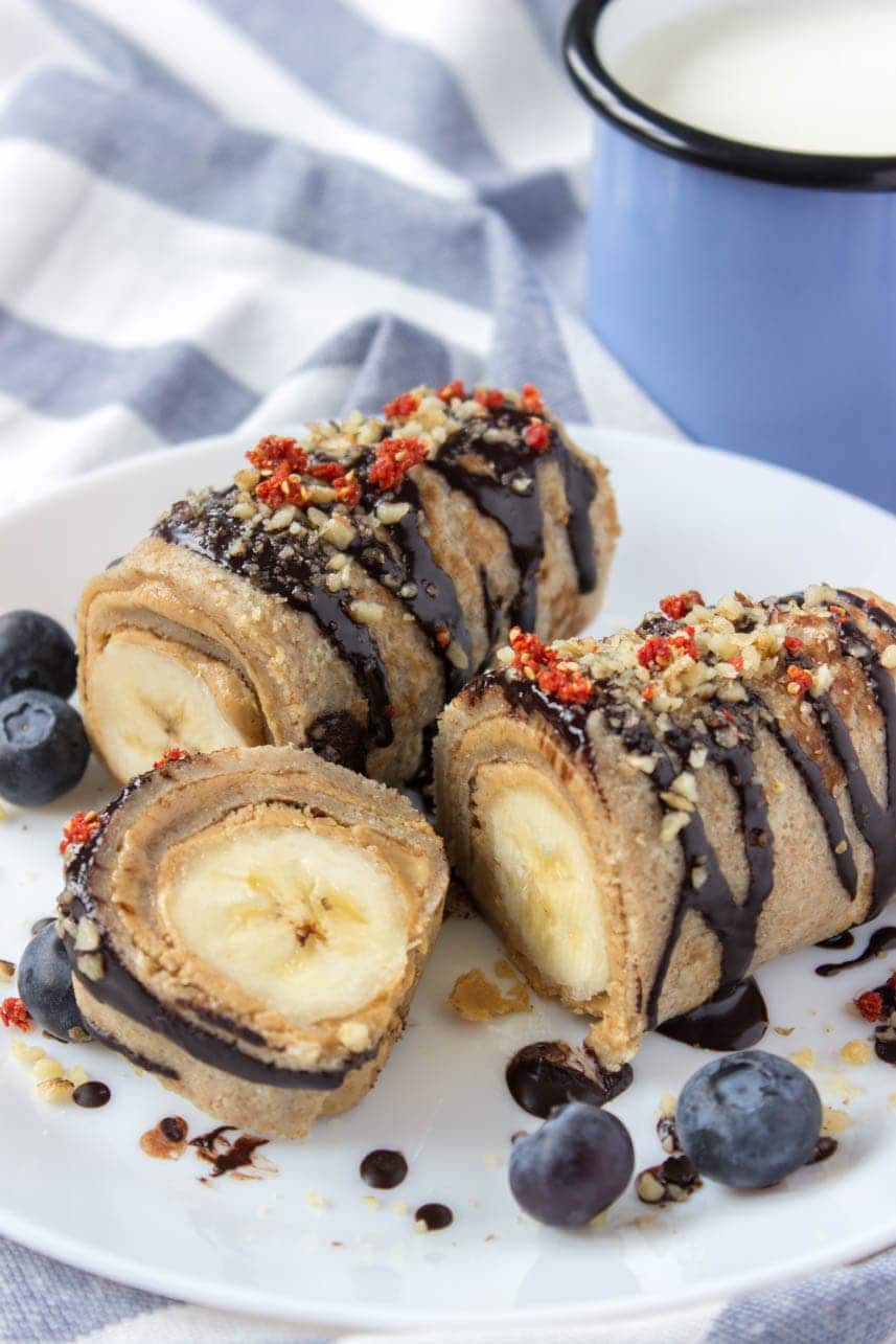 Chocolate Peanut Butter Banana Roll Ups drizzled with dark chocolate