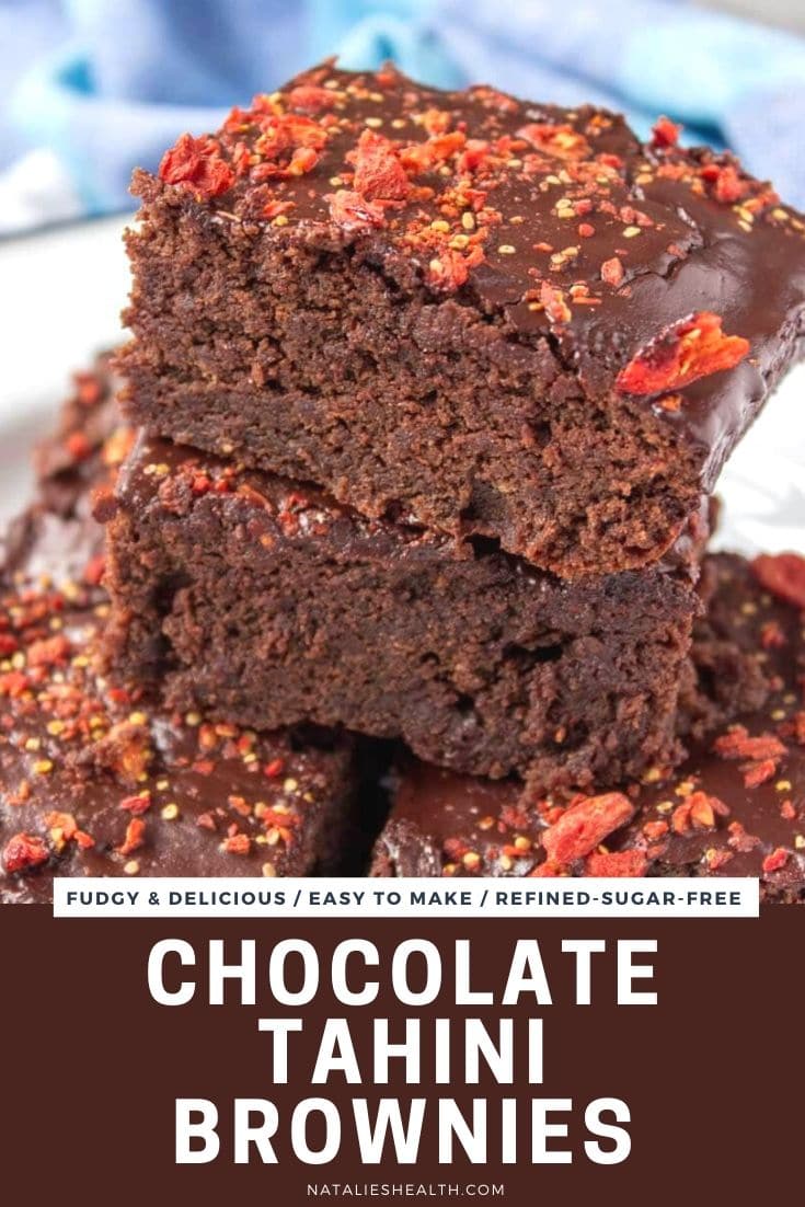 Chocolate tahini brownies with maca powder topped with melted dark chocolate and goji berries