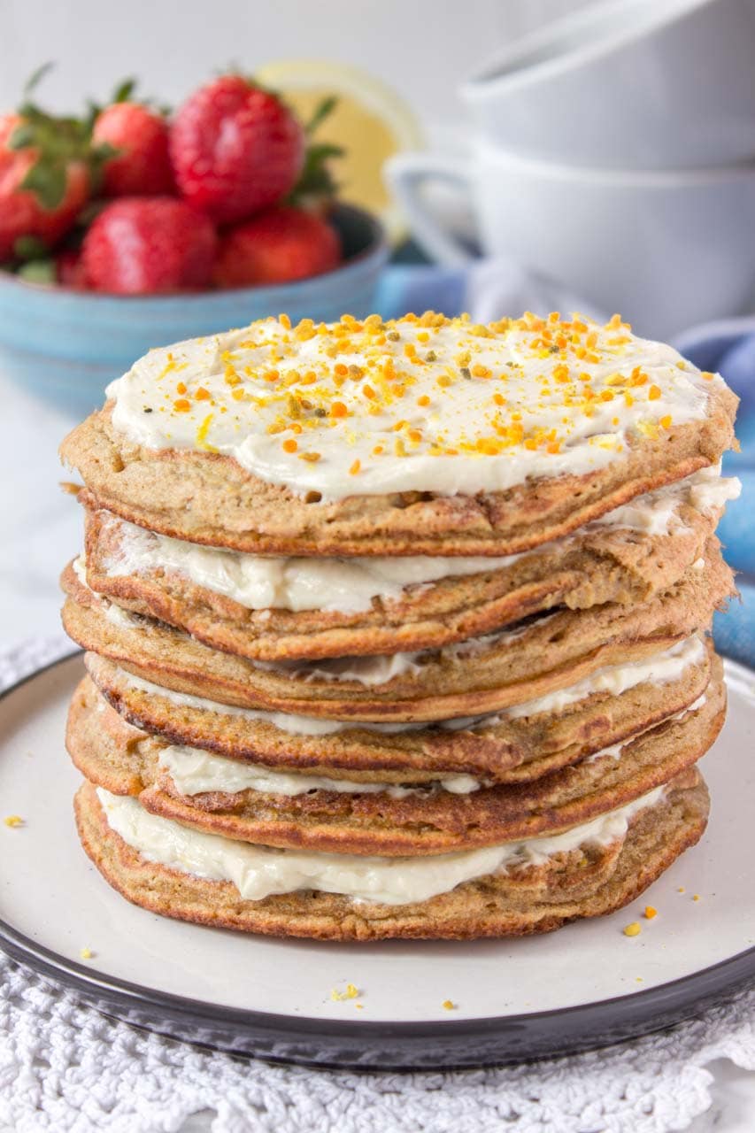 Whole grain healthy Lemon Cardamom Pancakes with cream cheese filling and strawberries