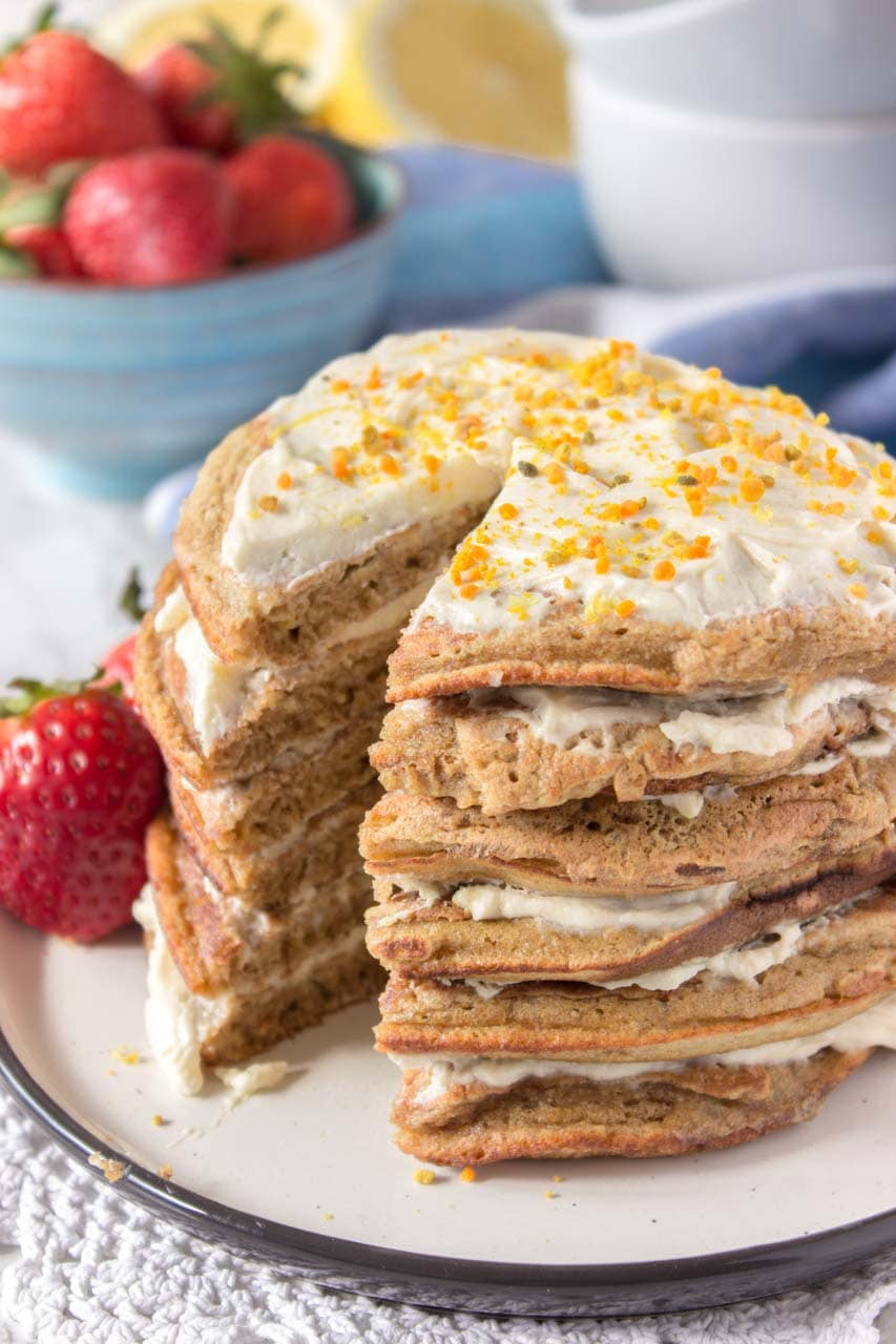 Whole grain healthy Lemon Cardamom Pancakes with cream cheese filling and strawberries