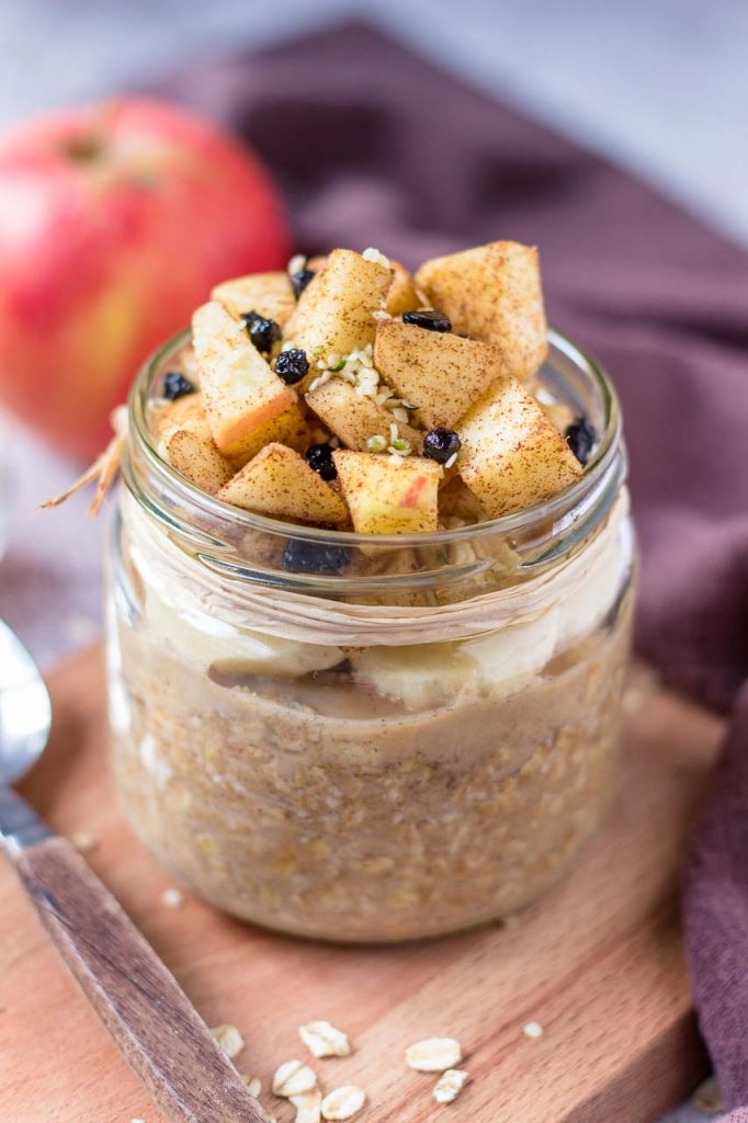 Apple Cinnamon Overnight Oats served in a jar topped with fresh chopped apples