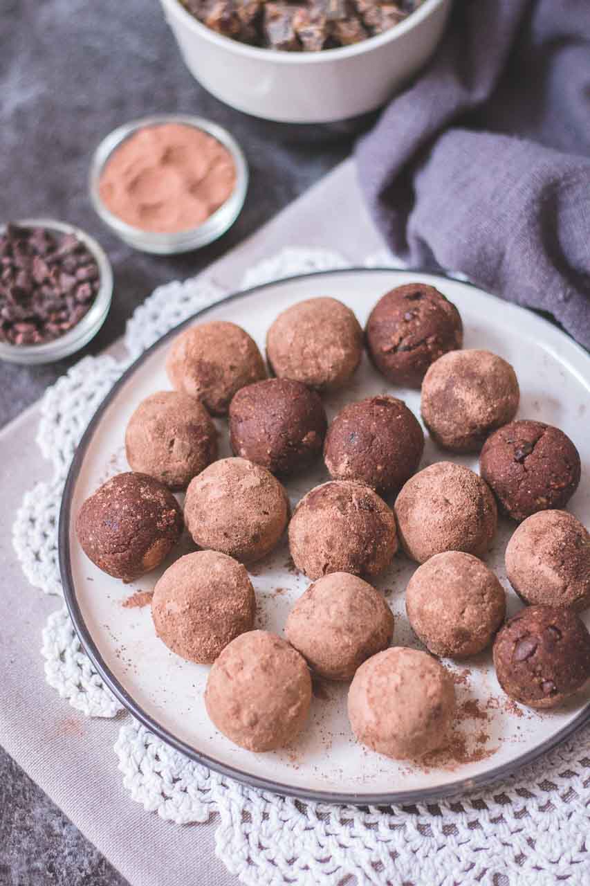 Chocolate No Bake Brownie Bites rolled in cacao powder