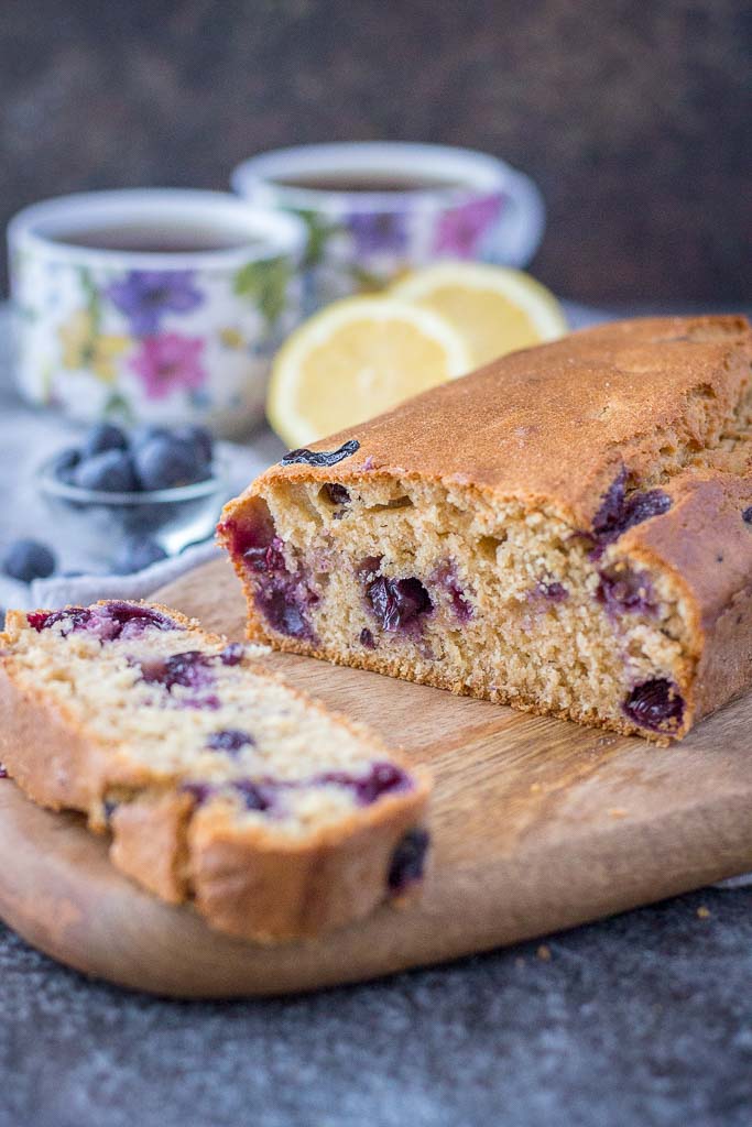 Healthy whole grain refined sugar-free Lemon Blueberry Pound Cake with fresh blueberries