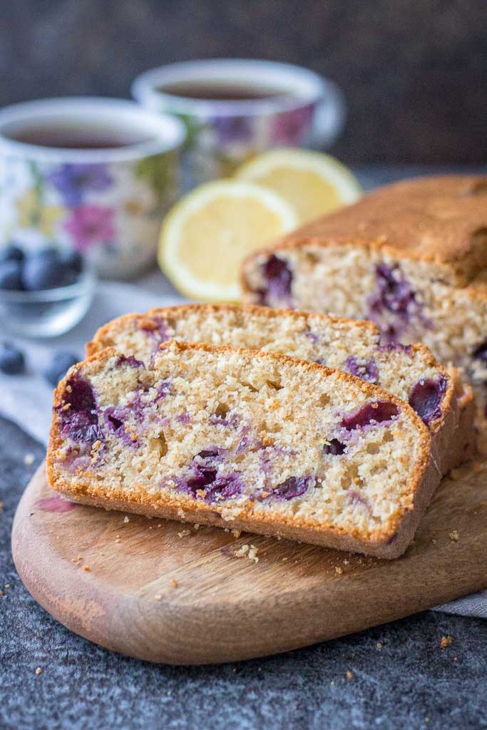Healthy whole grain refined sugar-free Lemon Blueberry Pound Cake with fresh blueberries