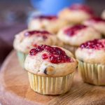 Mini Peanut Butter Banana Muffins with chocolate chips topped with raspberry jam
