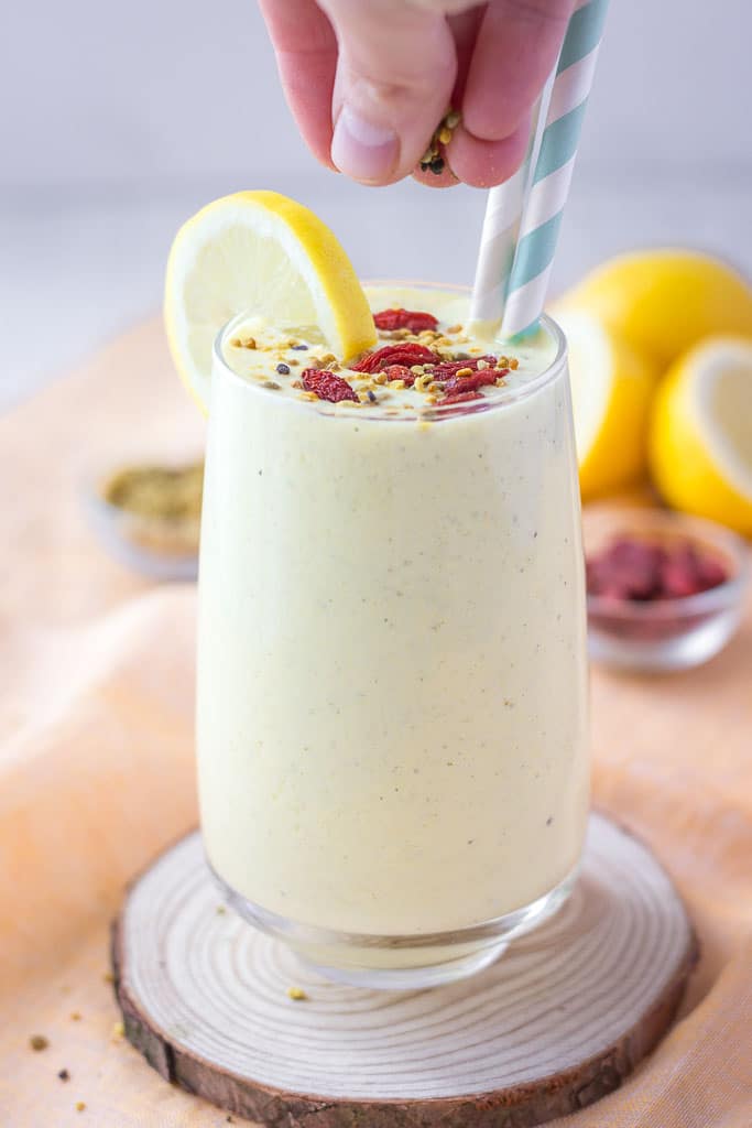 Lemon Yogurt Smoothie with turmeric and hemp seeds topped with goji berries
