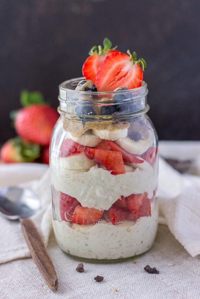 overnight oats with yogurt topped with strawberries and banana