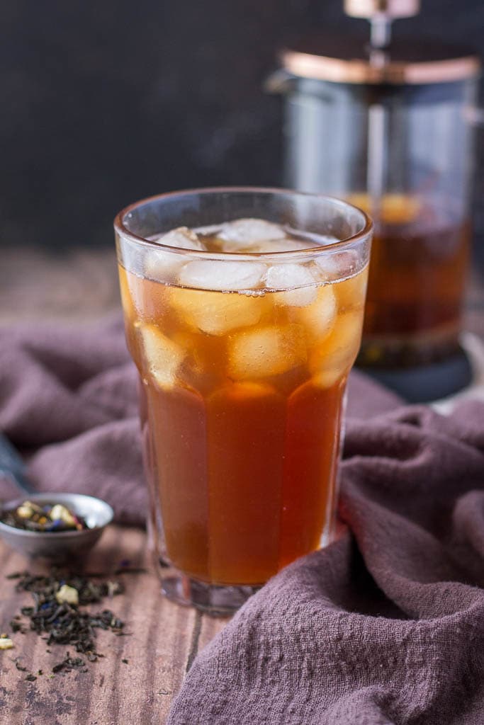 Cold Brewed Iced Earl Gray Latte served in a tall glass with ice cubes