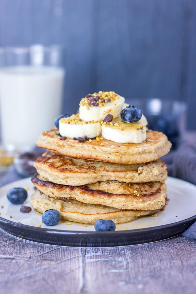 Blueberry Banana Pancakes recipe with oats topped with banana