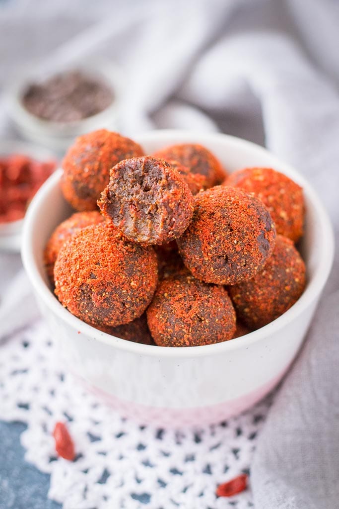 Maca bliss balls recipe with cacao, goji berries, and walnuts