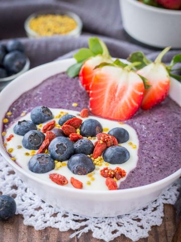 Blueberry Acai Smoothie Bowl topped with fresh berries and superfoods