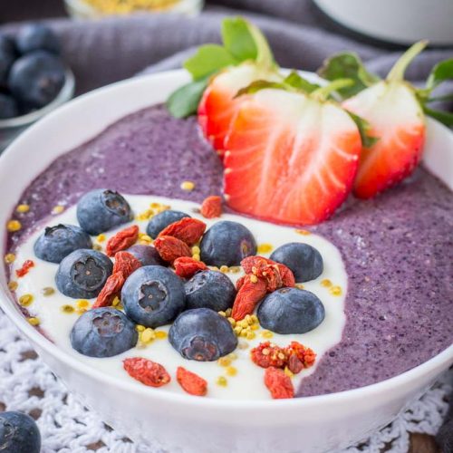 Blueberry Acai Smoothie Bowl topped with fresh berries and superfoods