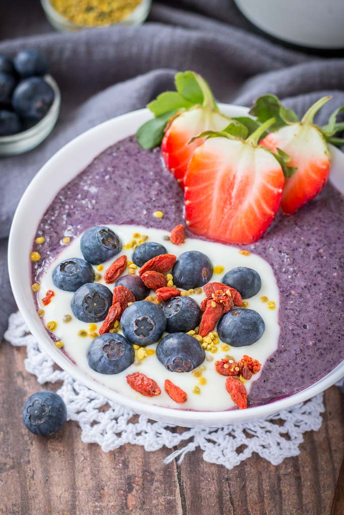 Blueberry Acai Smoothie Bowl topped with fresh berries and superfoods