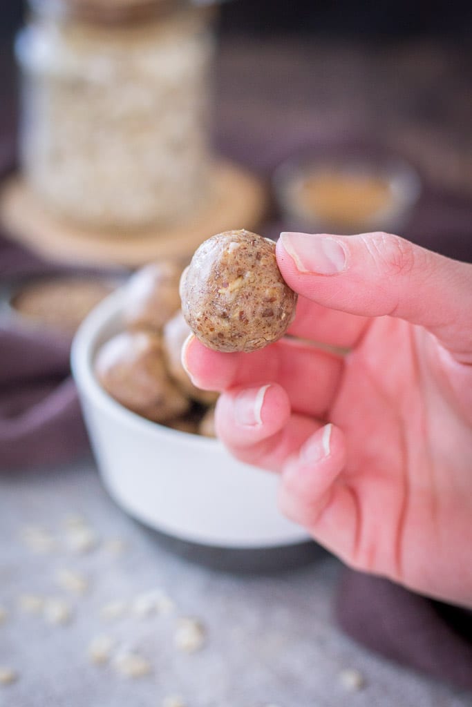 Peanut Butter Protein Balls with oats, peanut butter, and flax seeds served in a bowl