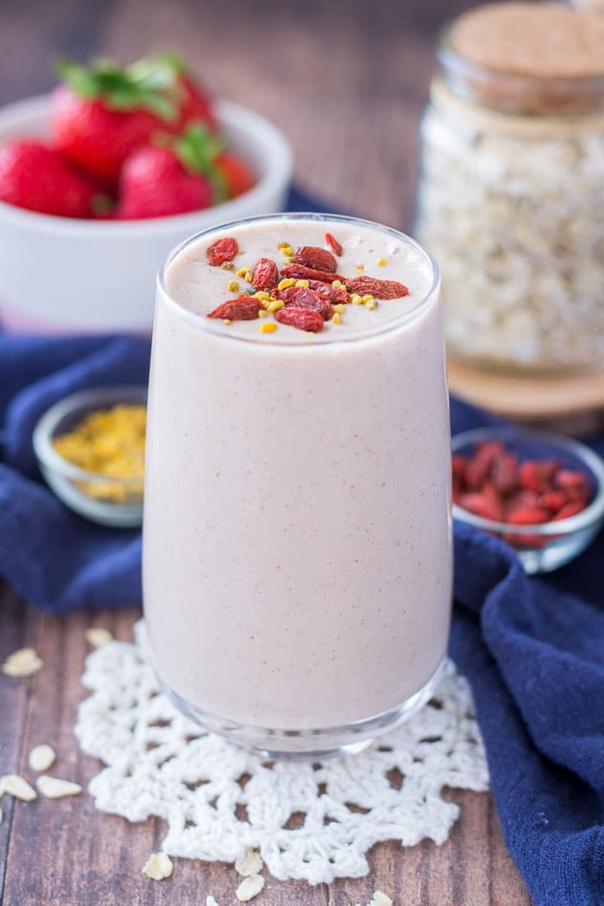 Strawberry Oatmeal Smoothie with banana, topped with goji berries