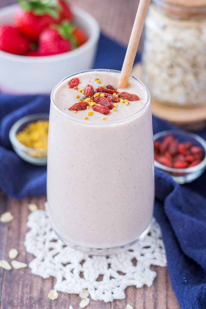 Strawberry Oatmeal Smoothie with banana, topped with goji berries