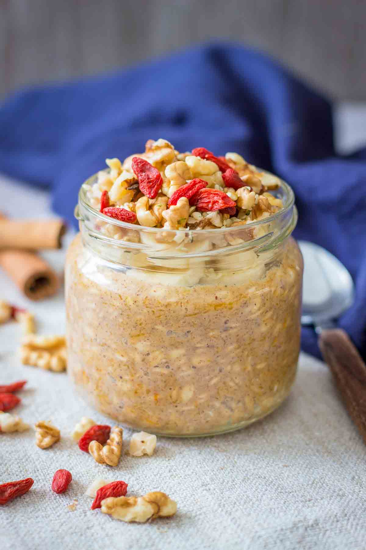 Pumpkin Overnight Oats topped with walnuts and goji berries