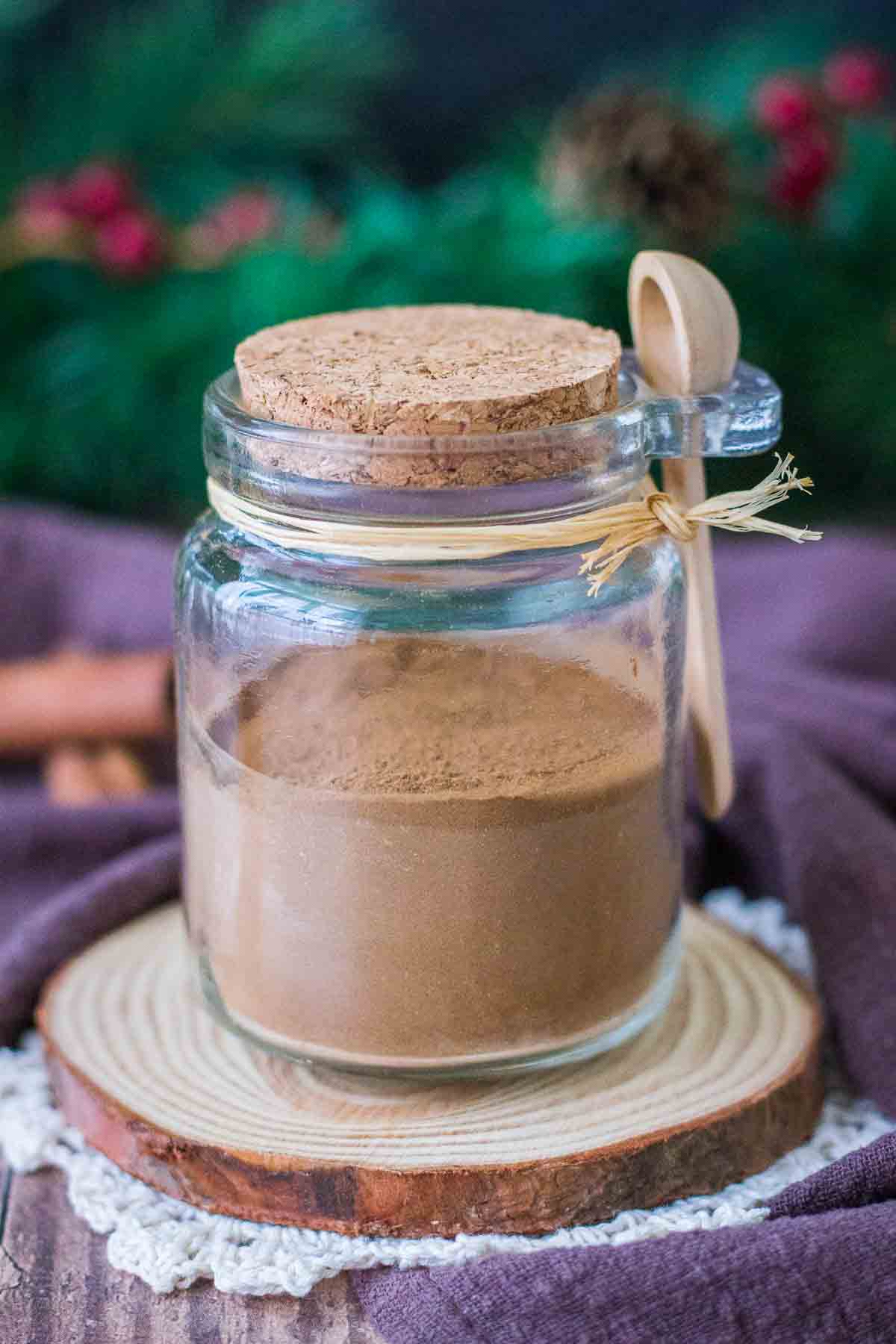 Homemade Gingerbread Spice Mix stored in a glass jar