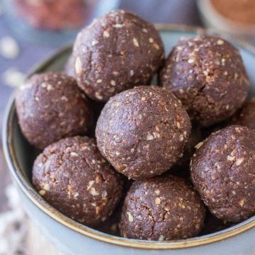 A closeup of a Chocolate Peanut Butter Balls served in a small bowl