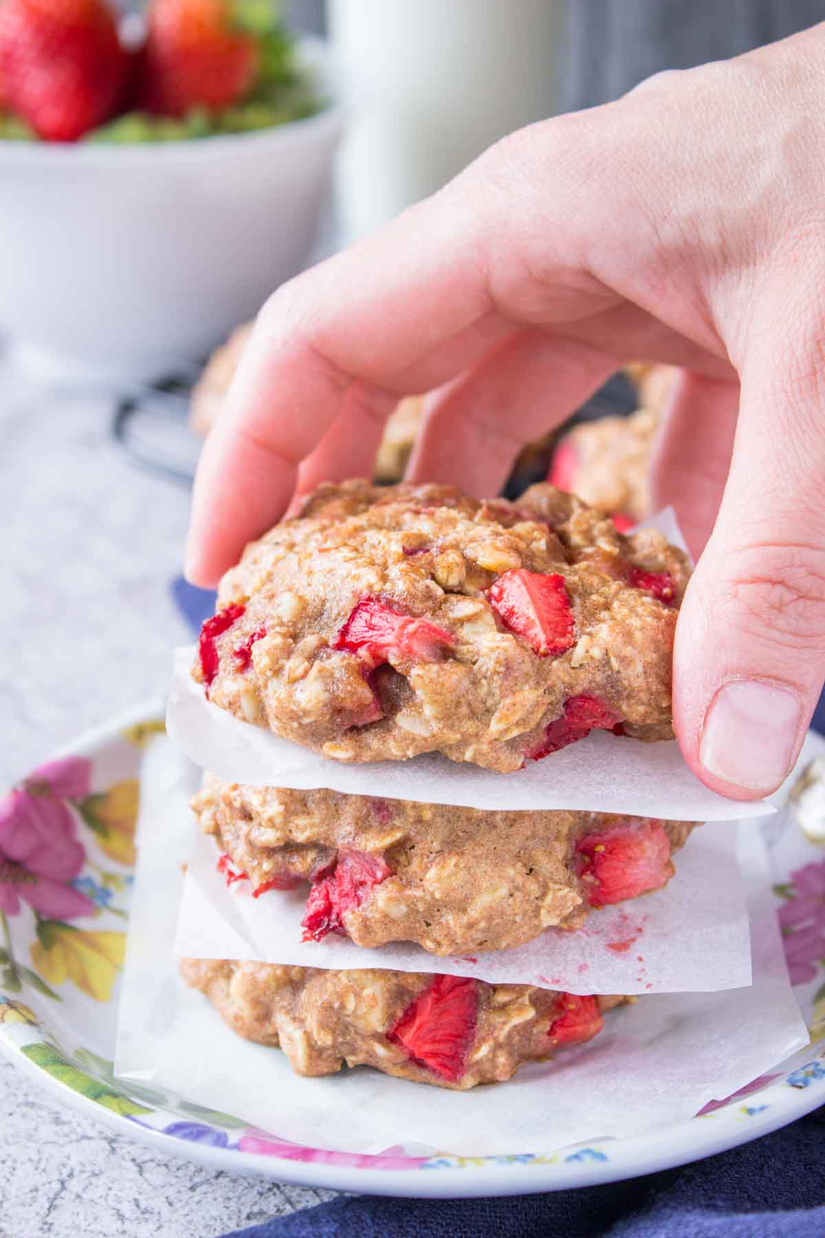 Hand taking Strawberry Cookies