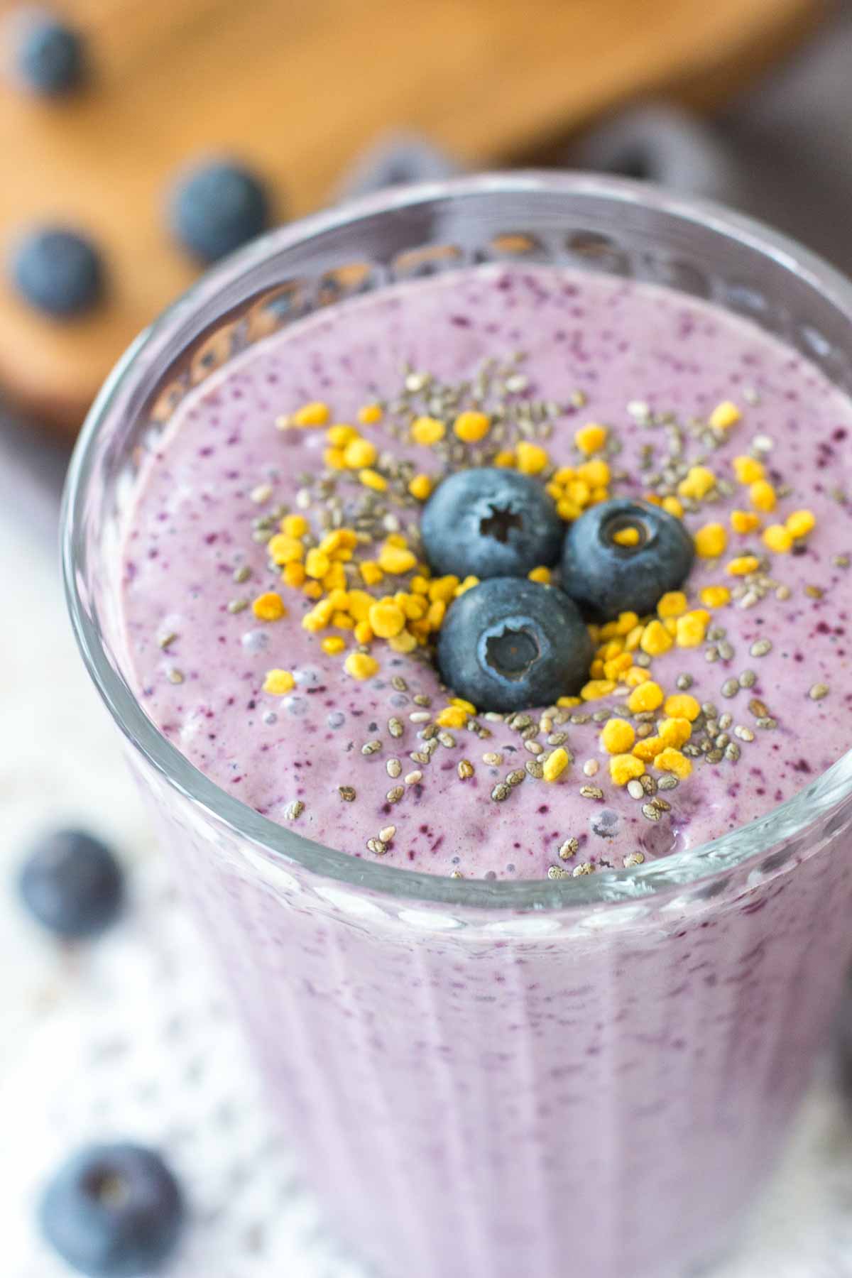 Closeup of Blueberry Chia Smoothie topped with fresh blueberries