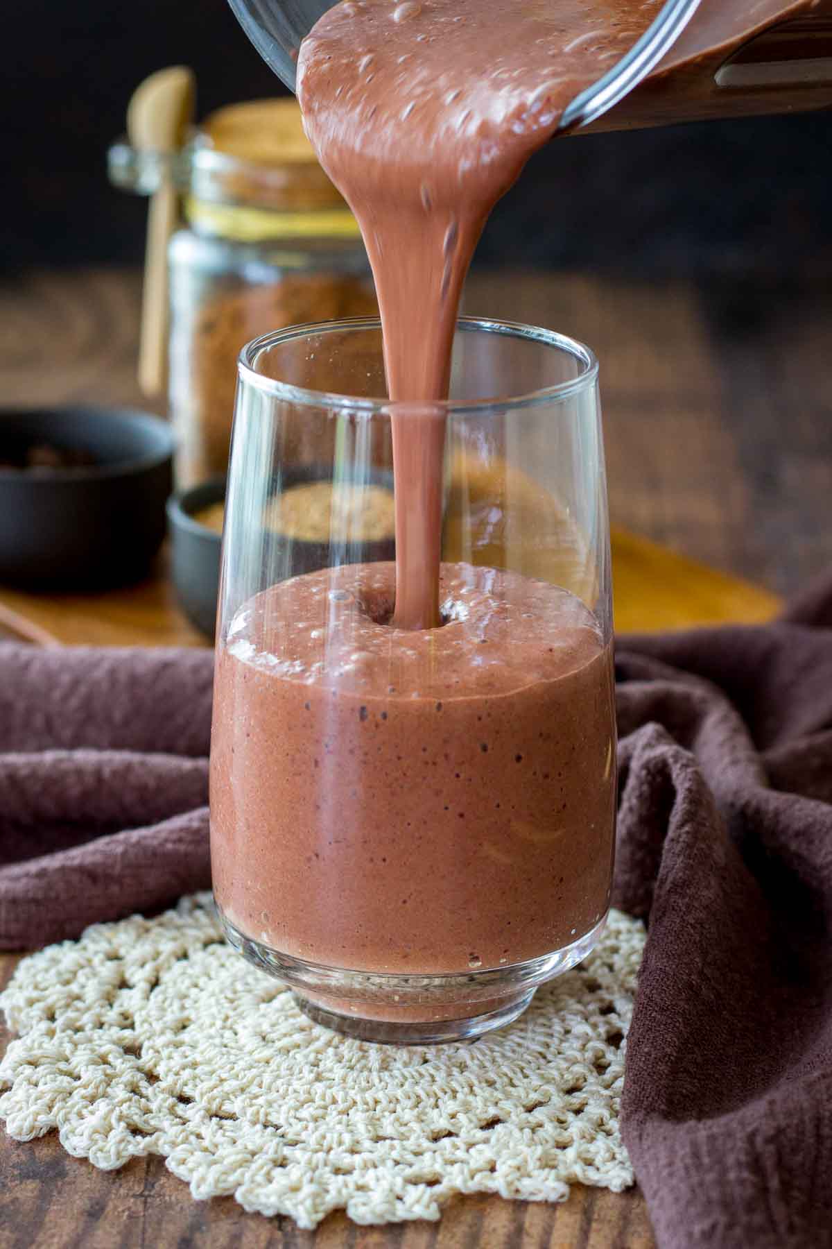 Pouring Cherry Chocolate Smoothie in a glass