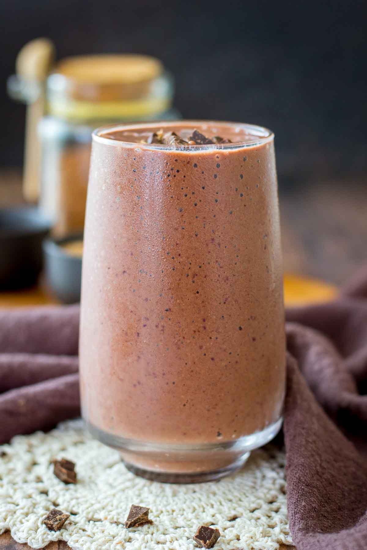 Cherry Chocolate Smoothie served in a glass topped with dark chocolate