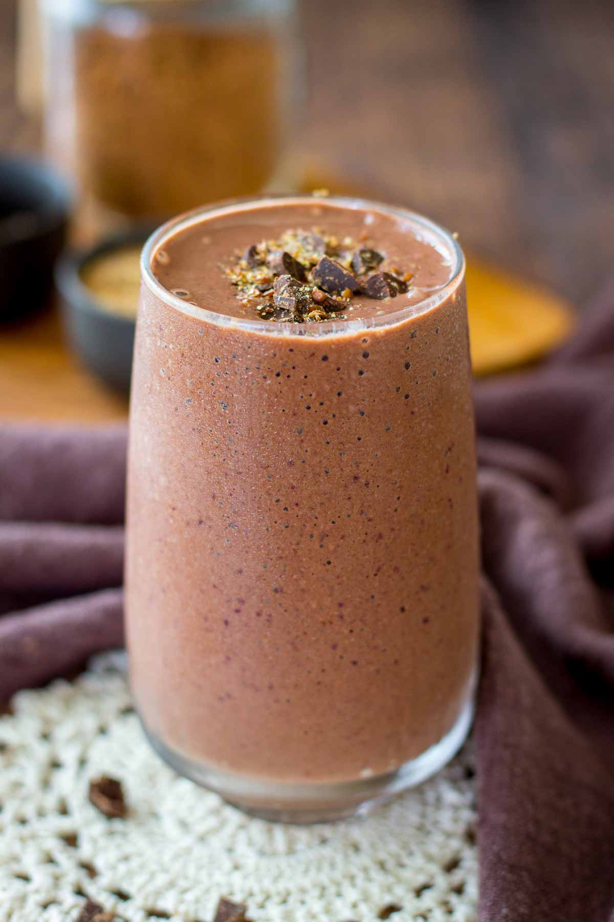 Cherry Chocolate Smoothie served in a glass topped with dark chocolate