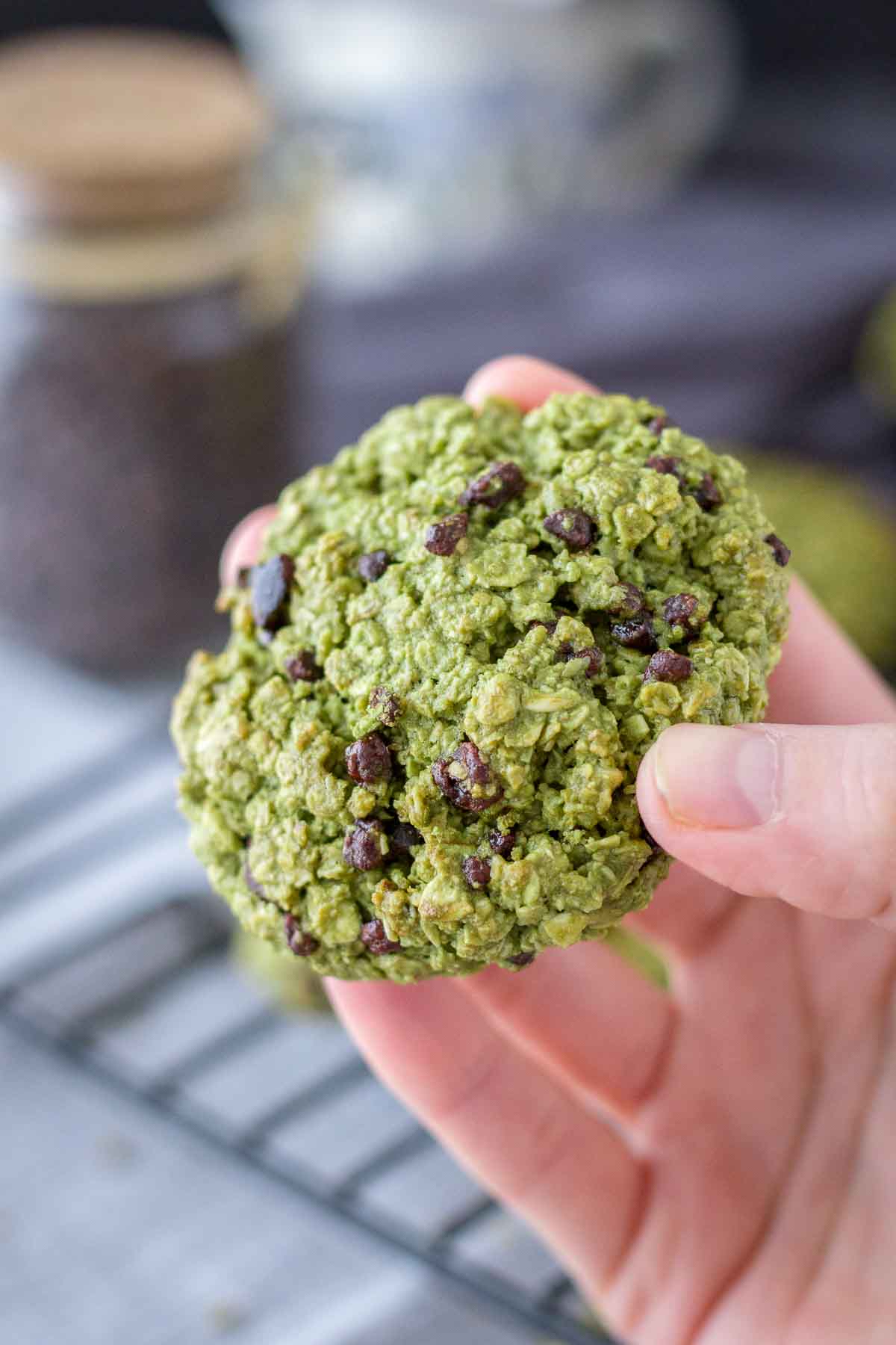 Hand holding Matcha Chocolate Chip Cookies