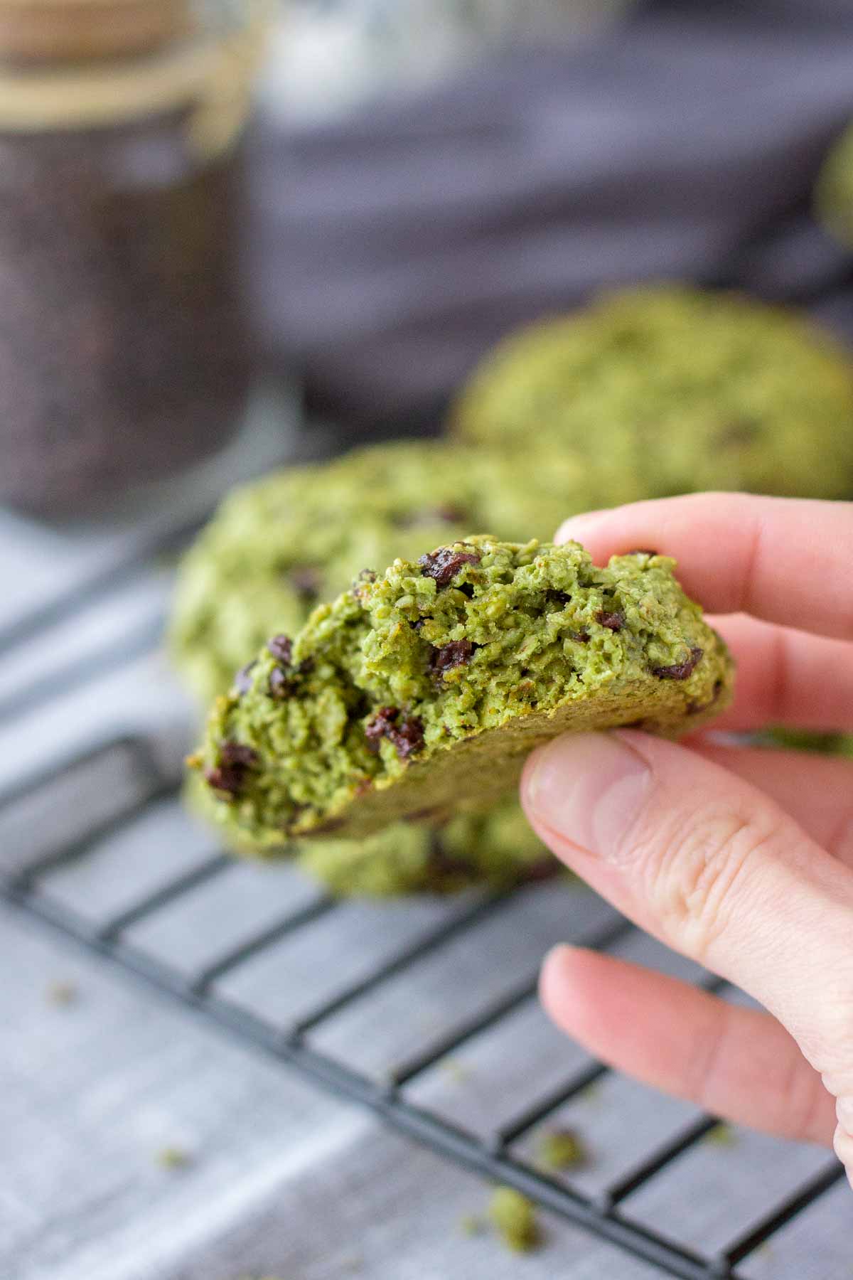 Hand holding Matcha Chocolate Chip Cookies