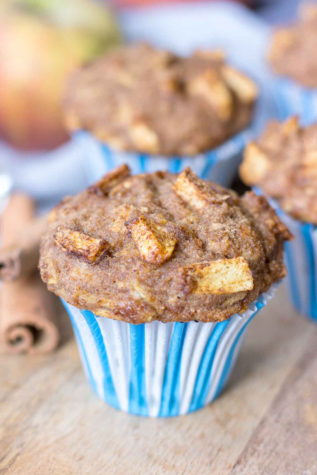 Apple Cinnamon Muffins served on a wooden plate