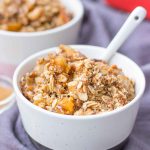 Apple Pear Crisp served in a bowl with a spoon